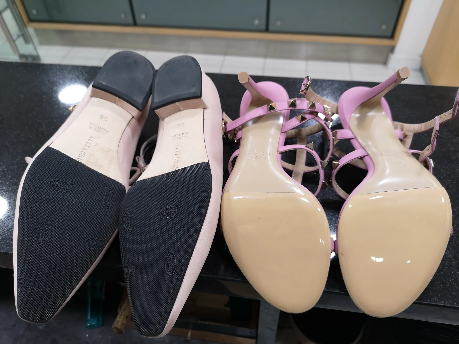 Women's designer heels and sandals after sole repair