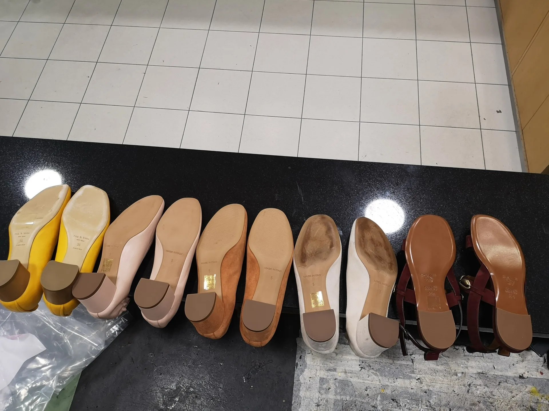 A batch of women's shoes finished with new soles